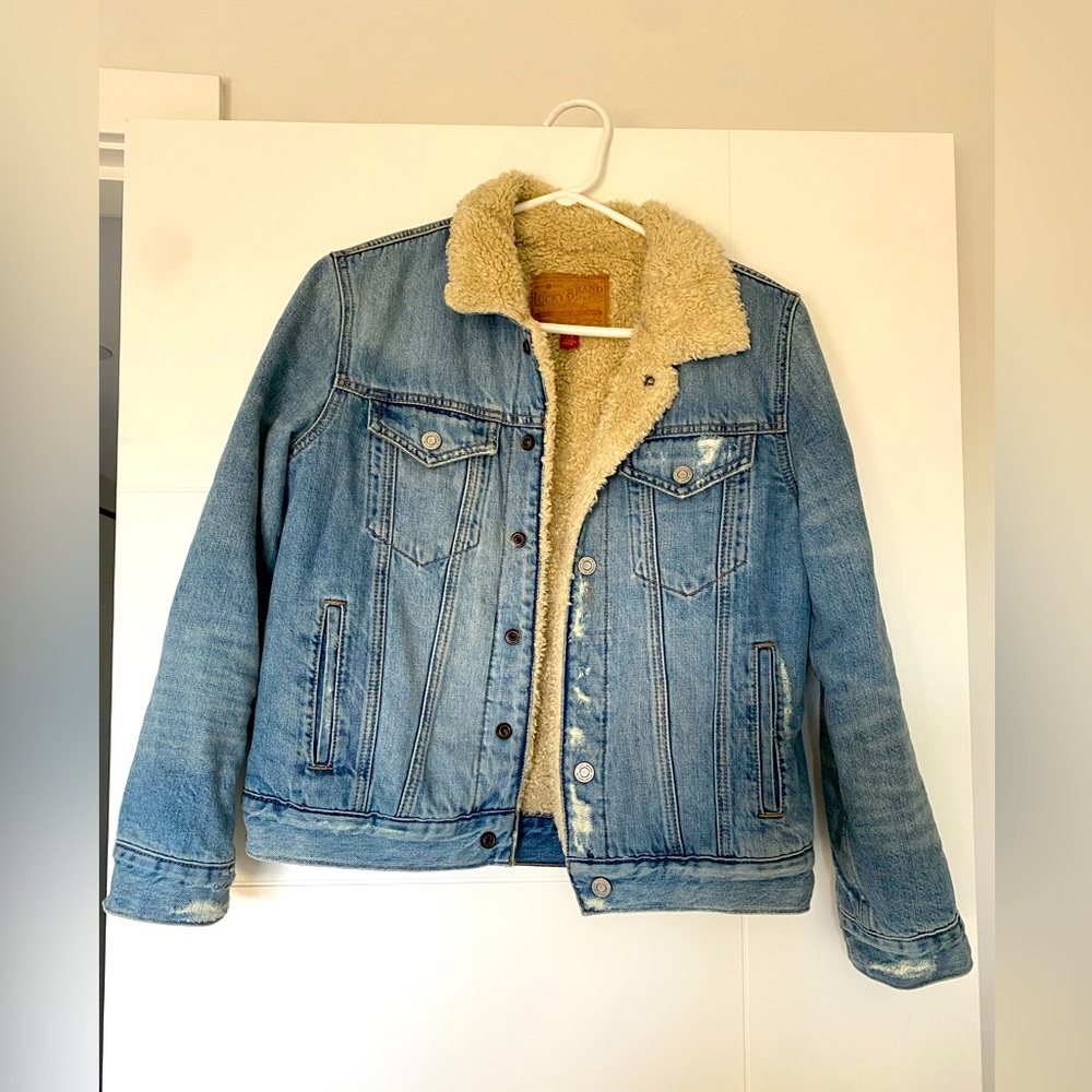 Lucky brand distressed jean jacket with Sherpa lining. Size small.
